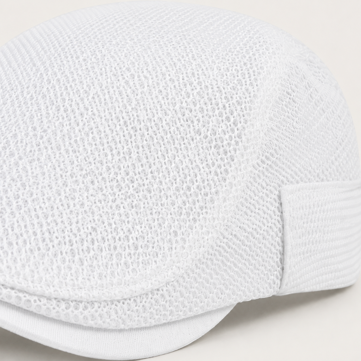 Close-up of Lewis Mesh Flat Cap mesh and stitching